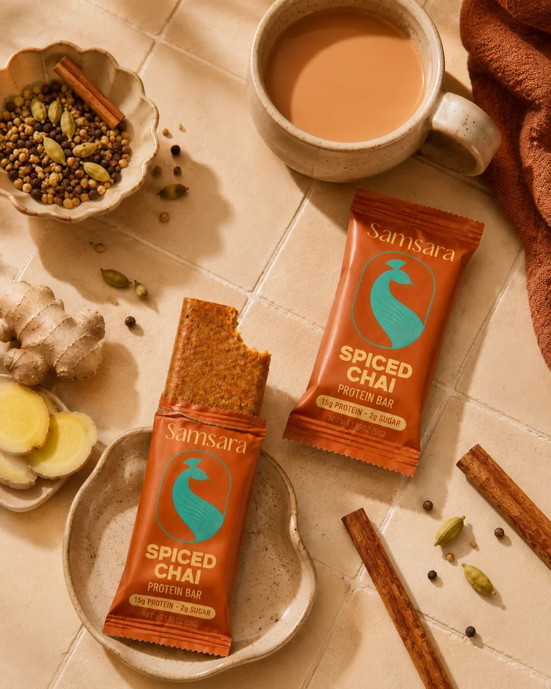 Spiced Chai bar with ginger, cardamom, and cinnamon on a cream tile counter